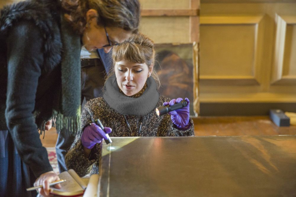 Examining the Petworth Beauties — copyright of James Dobson, National Trust