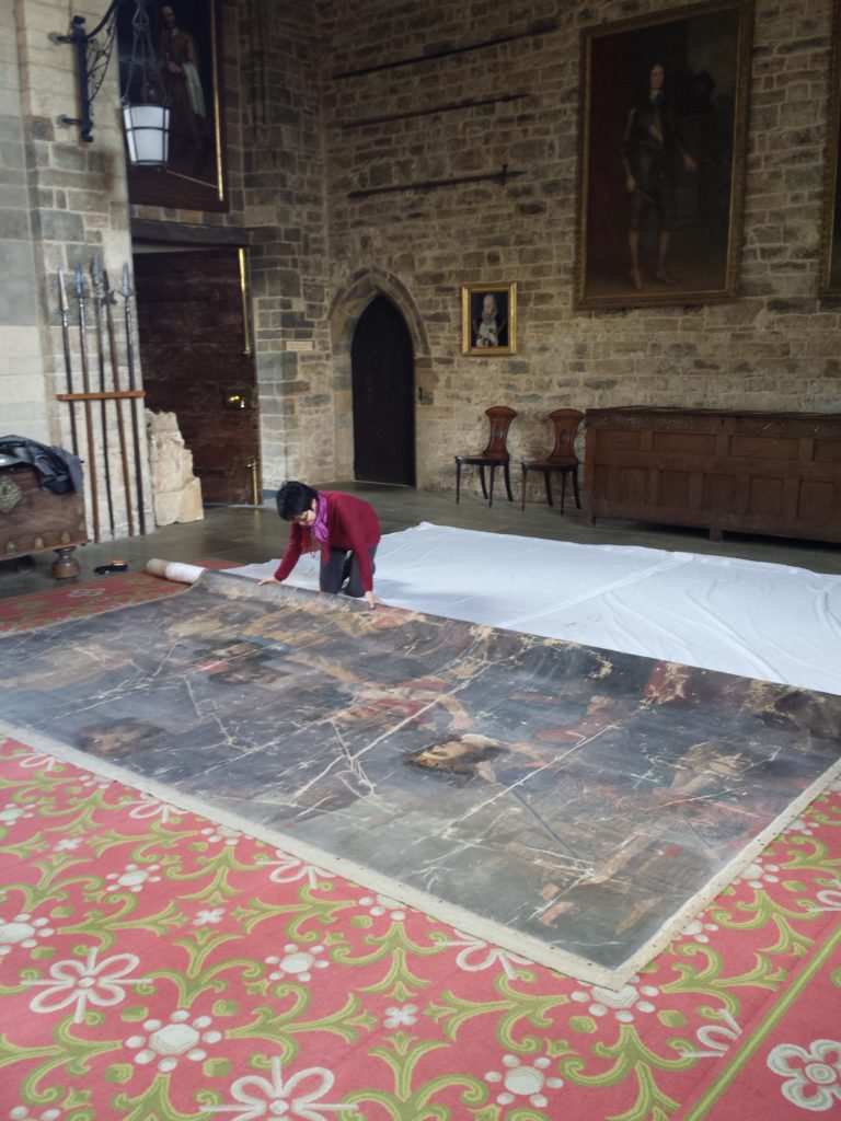 Stabilization treatment of a large 19th century oil painting carried out in situ at Broughton Castle